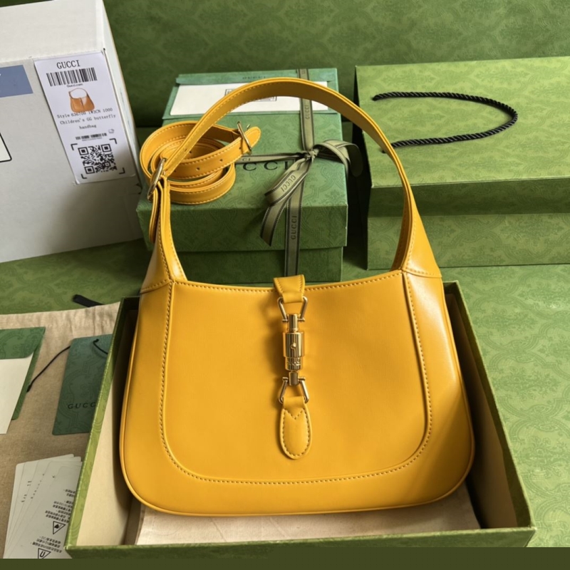 G*u*i top handle bags